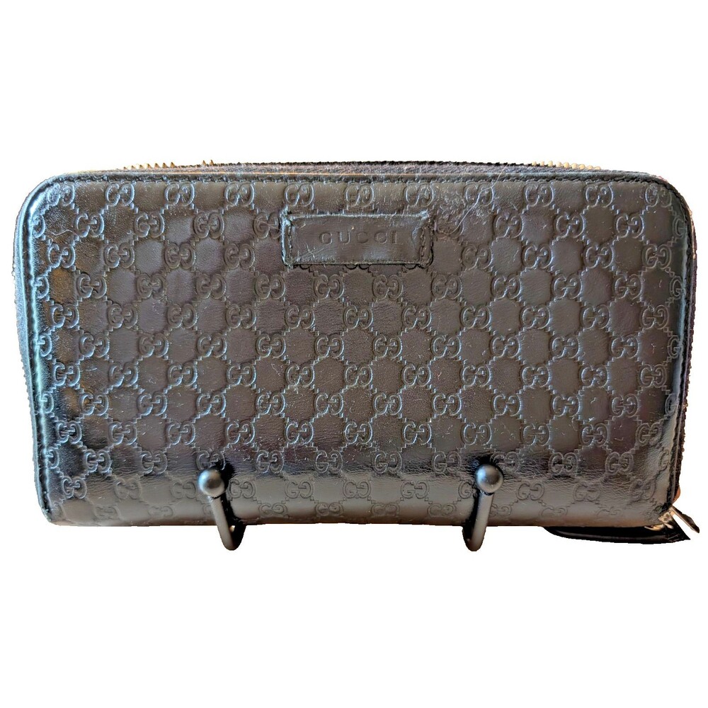 GUCCI Round Zip Micro Guccissima Wallet